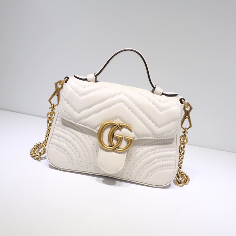 G*u*i top handle bags